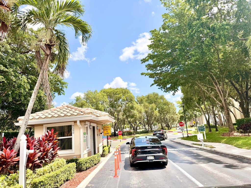 Photo of 9511 WELDON Circle #G108, Tamarac, FL 33321 (MLS # B26077899)