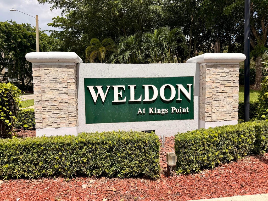 Photo of 9511 WELDON Circle #G108, Tamarac, FL 33321 (MLS # B26077899)
