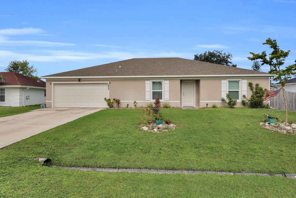 Photo of 1950 SW Diamond Street, Port Saint Lucie, FL 34953 (MLS # B26080481)
