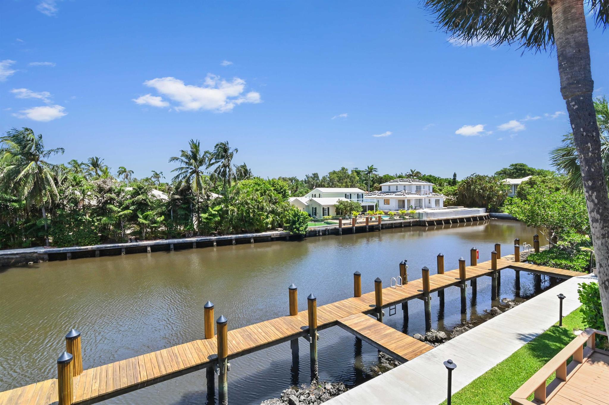 NEW 30' PRIVATE DOCK!!! Waterfront living at Waterway North community. Annual rental just moments away from the beach and the vibrant downtown Delray. The inviting living room is seamlessly connected to the gourmet kitchen featuring granite countertops and stainless steel appliances. A convenient half bath completes the first floor, while a waterfront patio beckons for serene moments of relaxation and enjoyment. On the second floor, you're greeted by lofty ceilings and an abundance of natural light. The spacious master bedroom boasts a private waterfront balcony, offering breathtaking views to start and end your day. Two generously sized guest rooms, and a full-sized washer/dryer. Impeccably maintained with a community pool and two assigned parking spaces, your waterfront retreat awaits