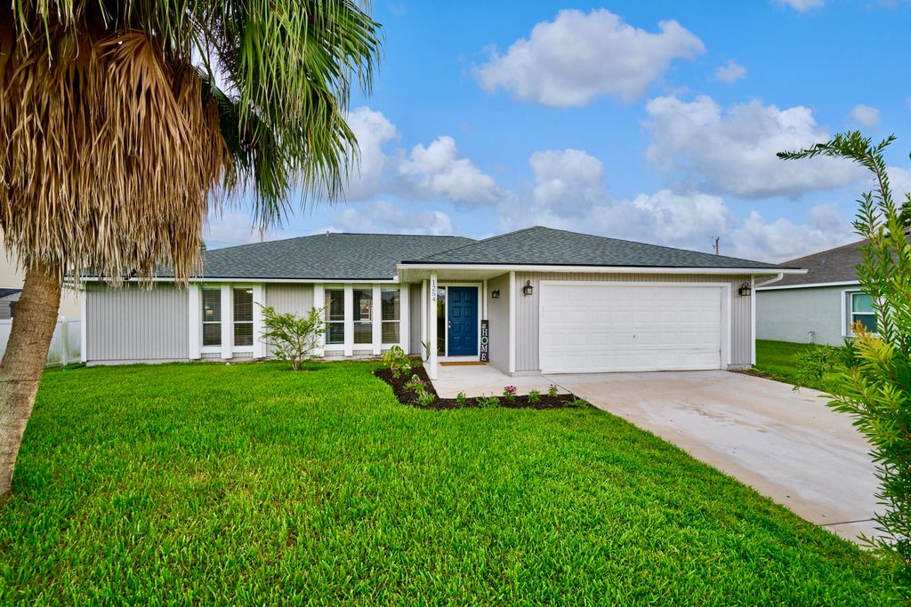 Photo of 1254 SW Asturia Avenue, Port Saint Lucie, FL 34953 (MLS # R11007349)