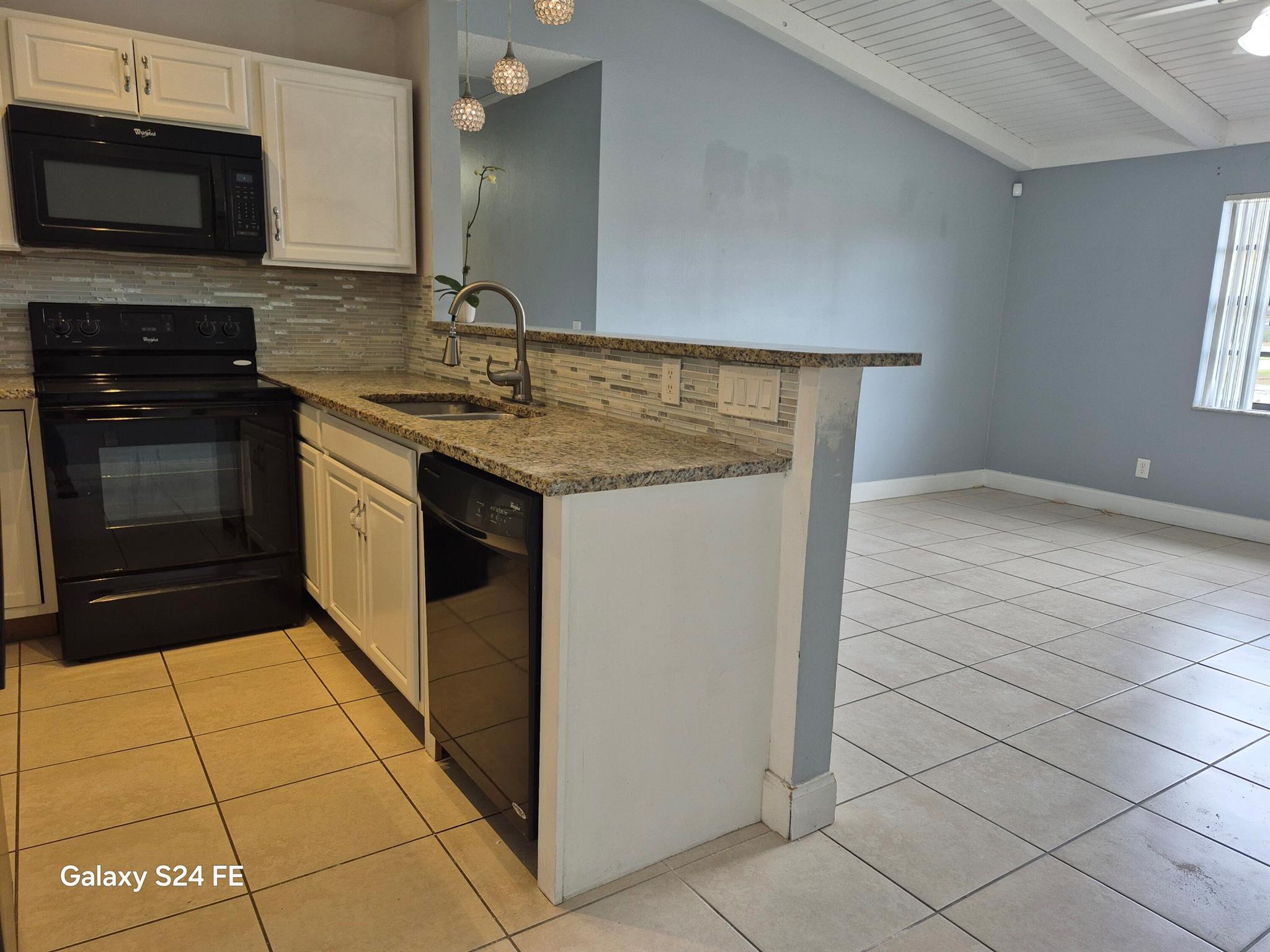 Spacious 3 Bedroom 2 bath condo Home. Located on a quiet street and close to everything, Fenced backyard that is great for kids.