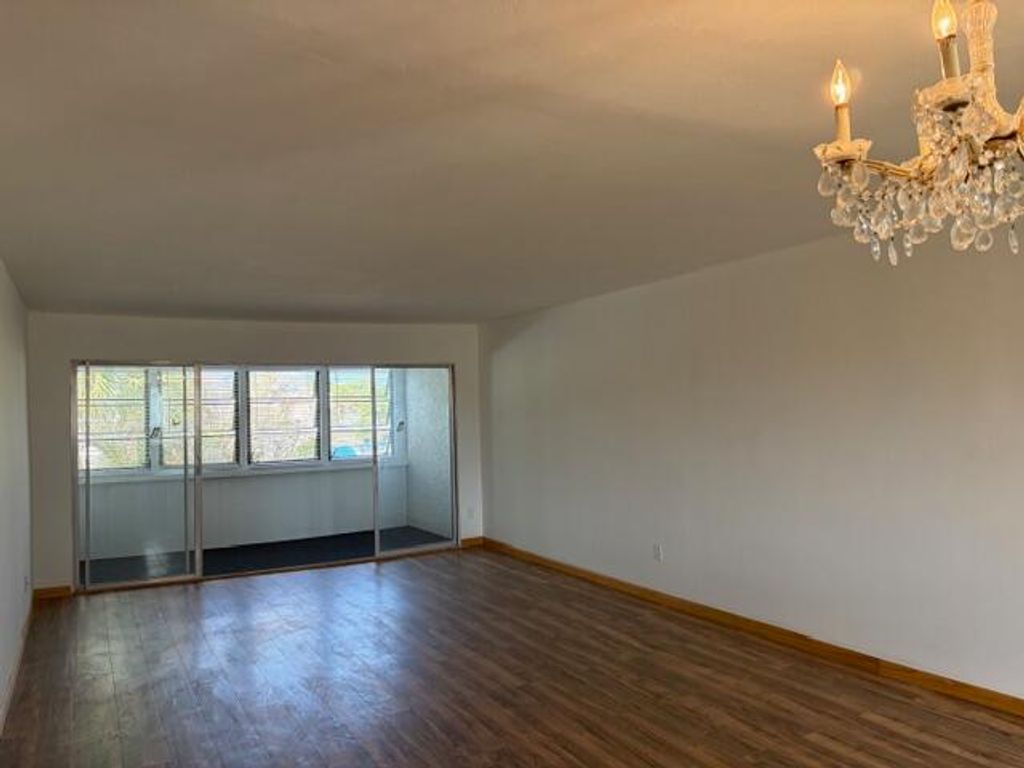 Photo of 1551 NE 13th Terrace Terrace NE #A13, Jensen Beach, FL 34957 (MLS # B26018761)