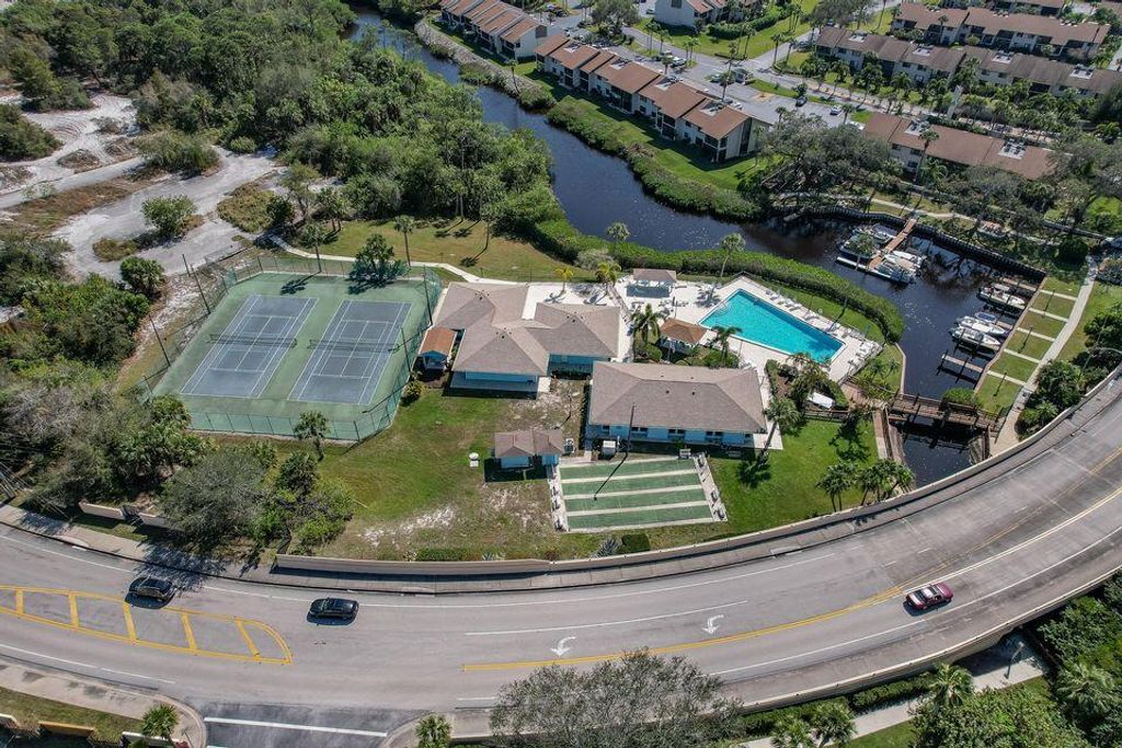 Photo of 1551 NE 13th Terrace Terrace NE #A13, Jensen Beach, FL 34957 (MLS # B26018761)