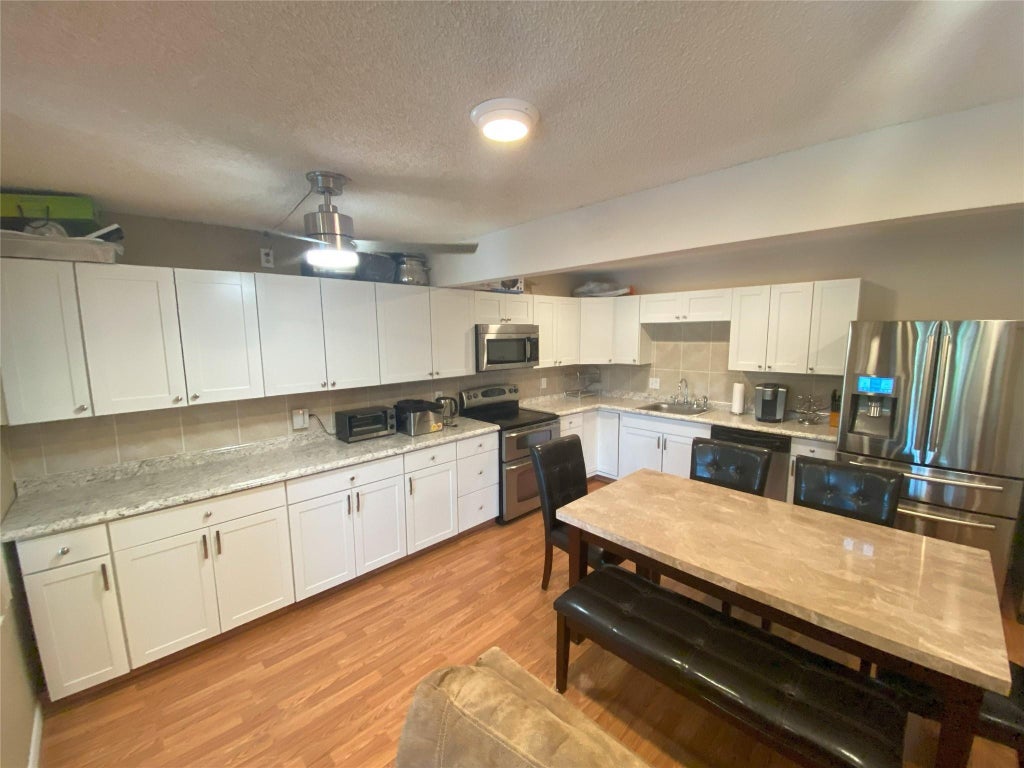 Photo of 821 SKY PINE Way #B2, Greenacres, FL 33415 (MLS # B26073348)