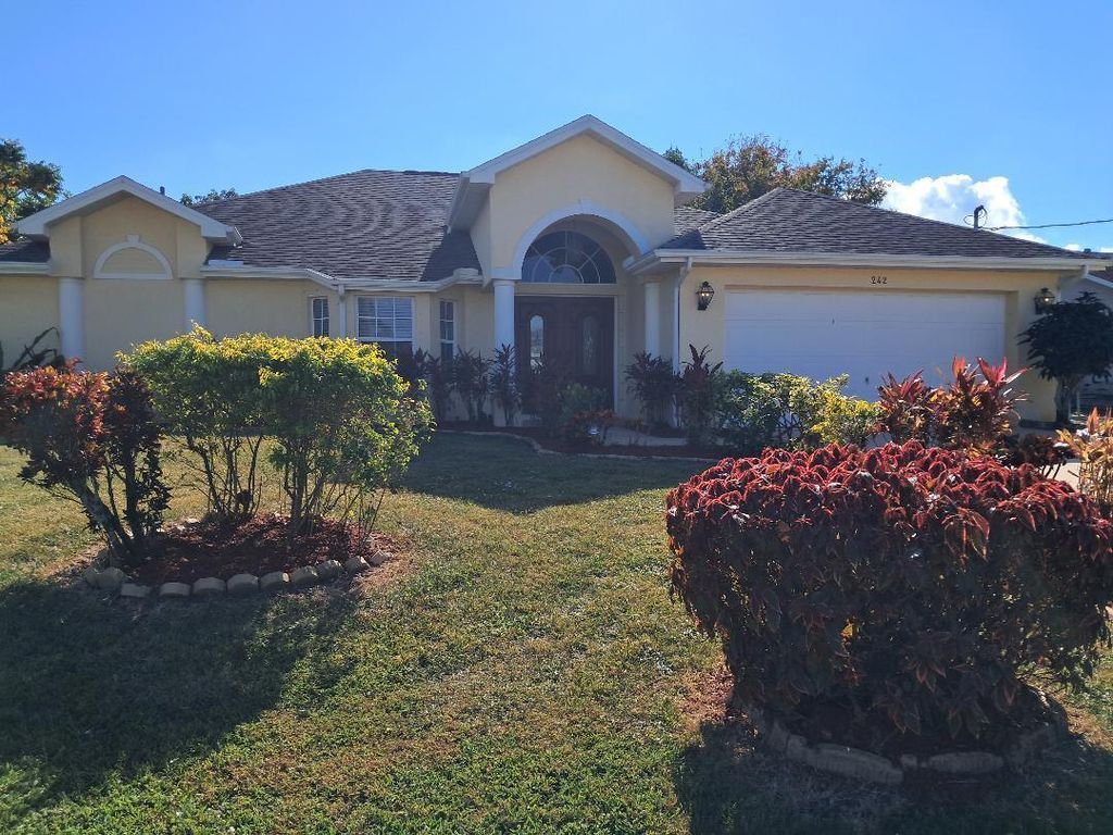 Photo of 242 SW Amesbury Avenue, Port Saint Lucie, FL 34953 (MLS # R11139054)