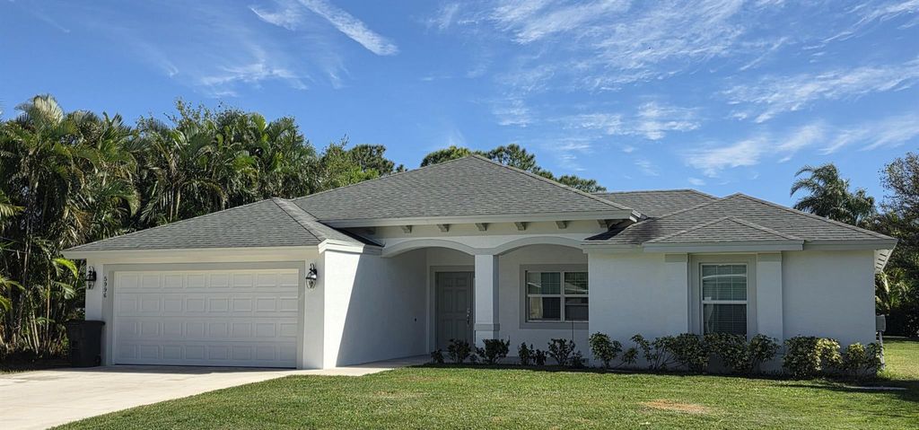 Photo of 5996 NW Baynard Drive, Port St Lucie, FL 34986 (MLS # R11071188)