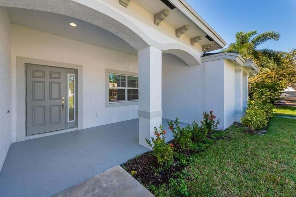 Photo of 5996 NW Baynard Drive, Port St Lucie, FL 34986 (MLS # R11071188)