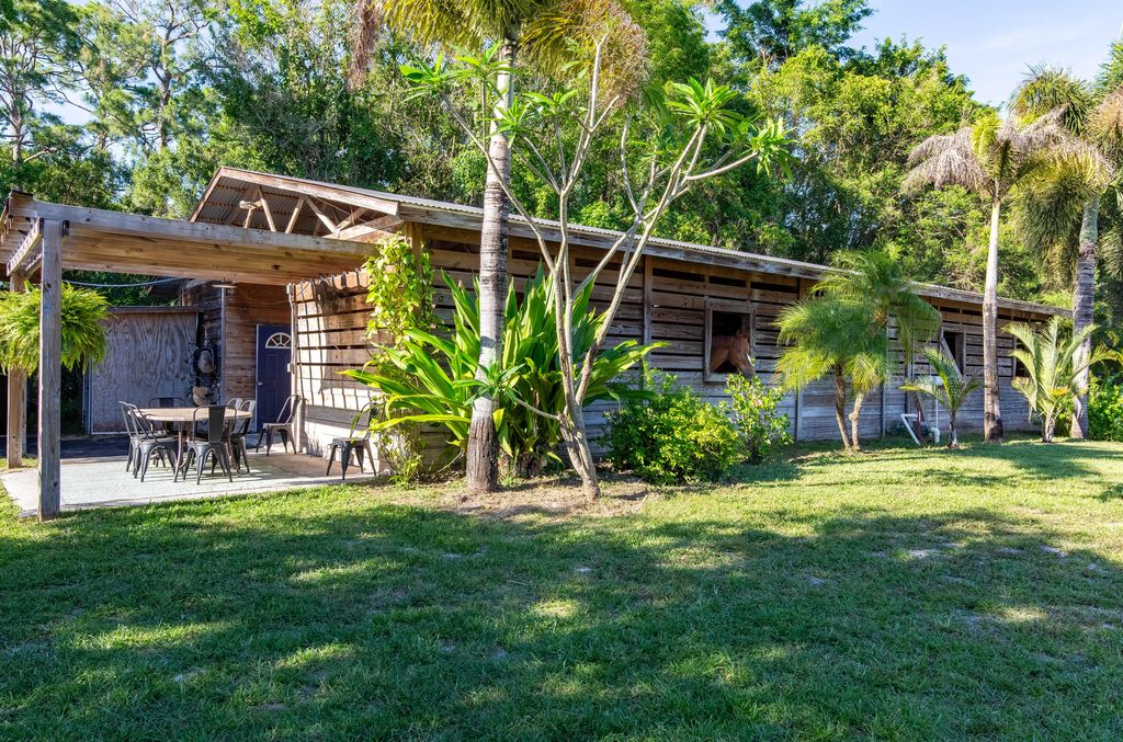 Photo of 851 Hyde Park Road, Loxahatchee Groves, FL 33470 (MLS # B26026969)
