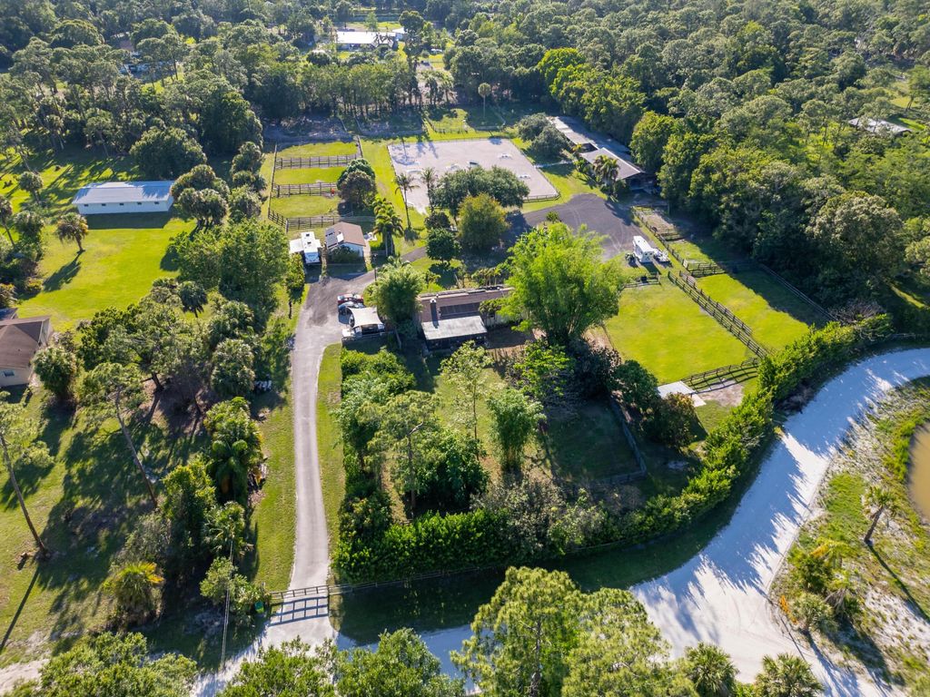 Photo of 851 Hyde Park Road, Loxahatchee Groves, FL 33470 (MLS # B26026969)