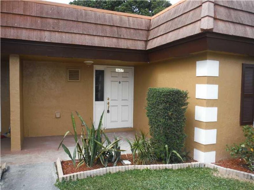Pretty 3 bedroom/2 bath townhouse in Deerfield Beach is ready for your personal touches. Home has a nice size kitchen with lots of counter space and pass through to the dining area, spacious bedrooms with ample closets, and two updated bathrooms. This one  story corner villa has been freshly painted and has new, neutral in color carpet. The kitchen has been remodeled with new counters and cabinets and tile flooring. Screened & roofed patio has tile flooring. Great location, all ages welcome pets too!
