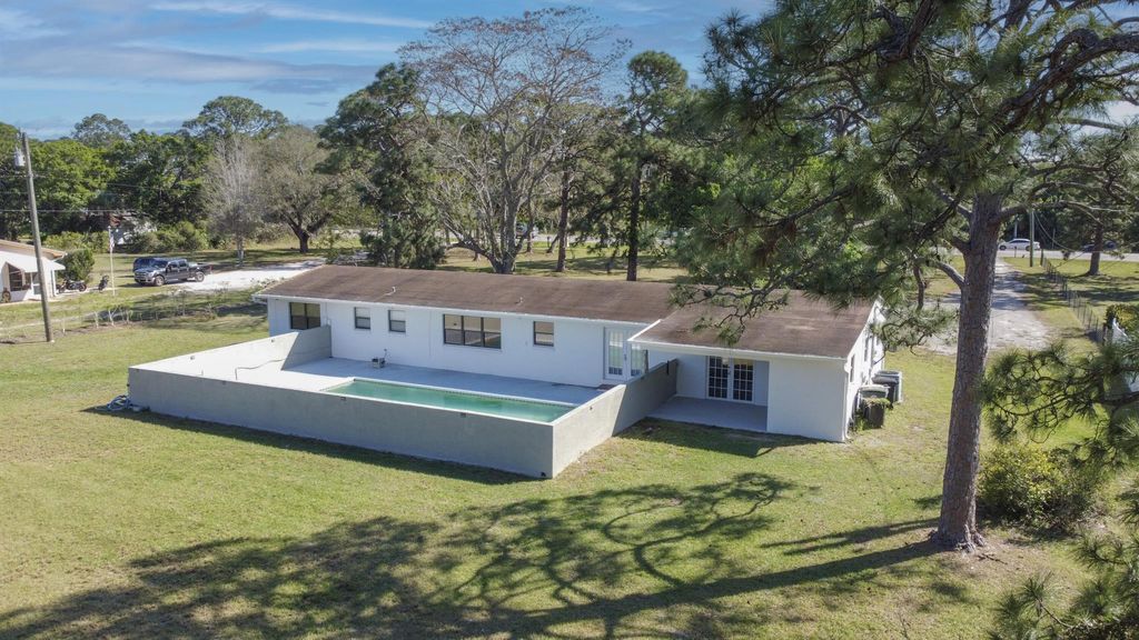 Photo of 4120 Edwards Road, Fort Pierce, FL 34981 (MLS # R10965705)