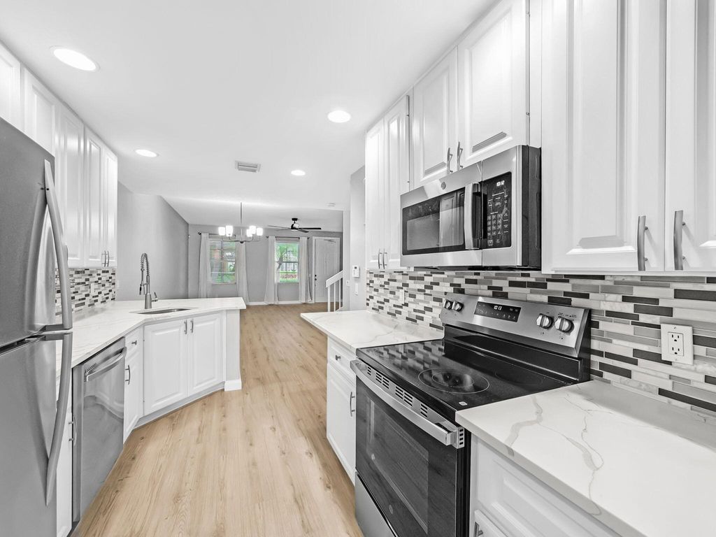 Photo of 3119 E Community Drive, Jupiter, FL 33458 (MLS # R11053470)