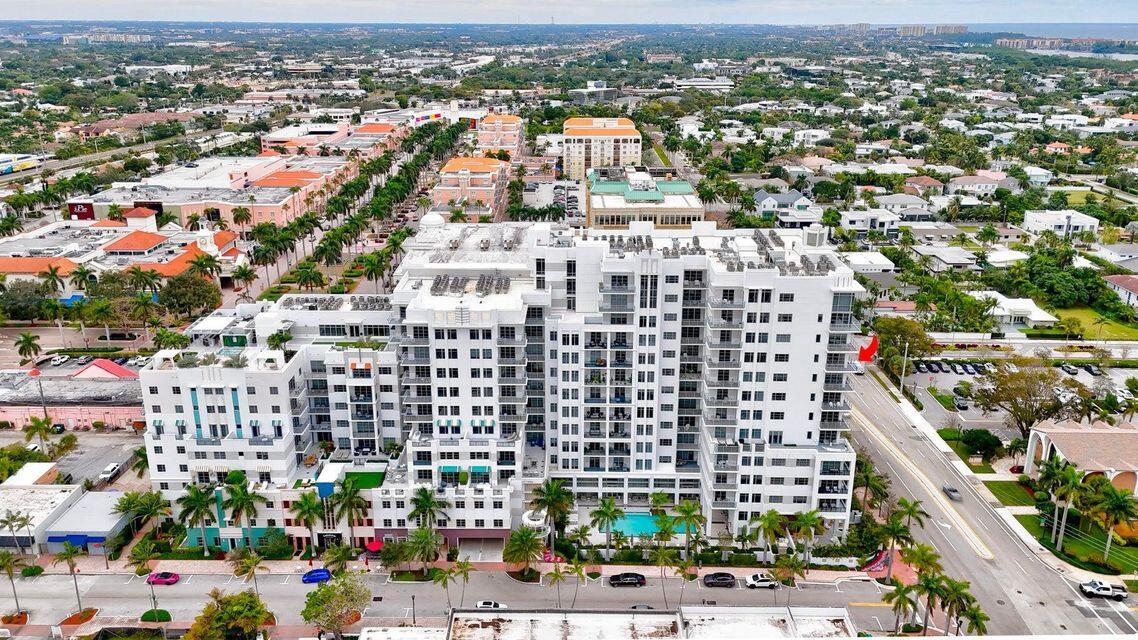 The premiere luxury building in the heart of downtown Boca overlooking Mizner Park. Welcome to your private Penthouse with modern sophistication and elegance. Every detail has been thoughtfully designed to blend this modern sophistication with timeless elegance. Whether you're seeking a serene retreat or a vibrant urban lifestyle, this property offers it all. Step into a world of luxury amenities, featuring a rooftop hot tub with panoramic views, state-of-the-art fitness center, and concierge services. The residence boast a gourmet kitchen outfitted with state of the art appliciances, perfectly designed for both entertaining and everyday living. Featuring 2 primary suites with finished walk-in closets. Wrap around terrace is ideal for picturesque sunsets.