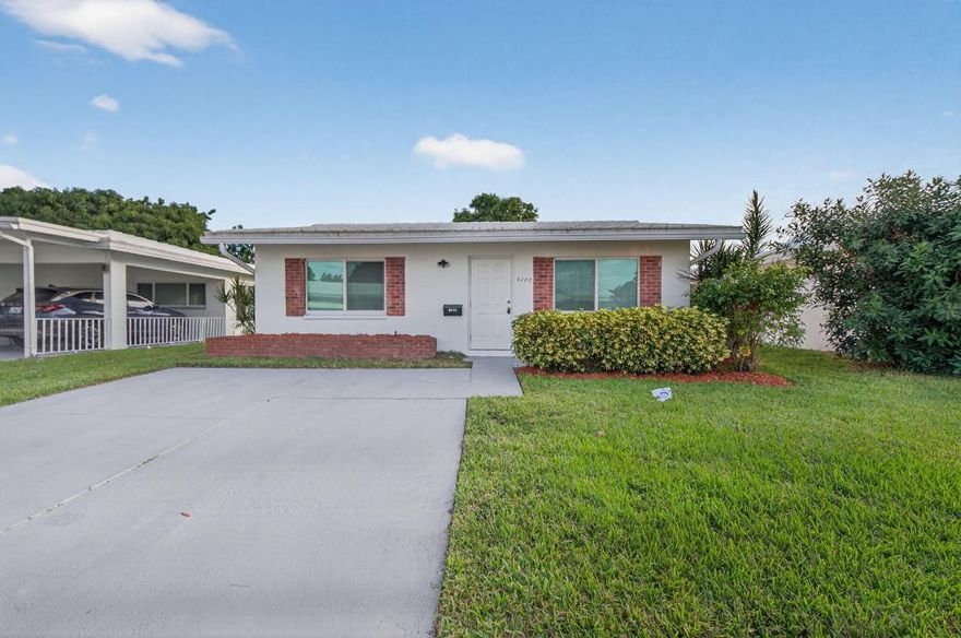 Beautifully updated 2-bedroom, 1-bath home in the desirable Fairhaven 14 community of Tamarac, a 55+ active adult neighborhood. This move-in-ready residence features an updated kitchen with granite countertops and stainless steel appliances, new laminate wood flooring throughout, and a remodeled bathroom with a modern vanity and tiled shower. The tile roof was replaced in 2011, and the AC unit in 2018 for peace of mind. Enjoy extra living space in the bright Florida room. The community offers a pool, clubhouse, and monthly activities for residents to enjoy. This property qualifies for a mortgage rate buydown of up to 3%!