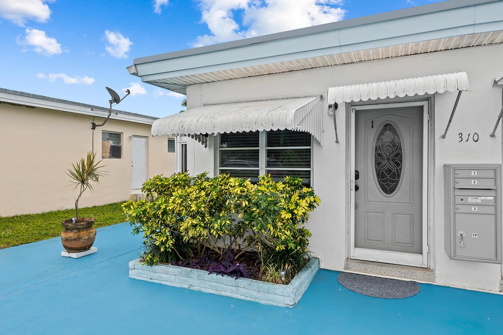 Photo of 310 NE 6th Street #1, Hallandale Beach, FL 33009 (MLS # B26029206)
