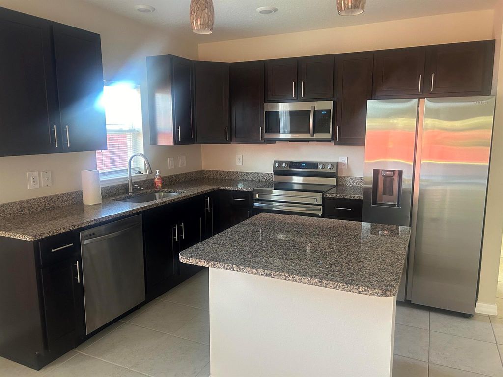 Photo of 2326 SE Patio Circle, Port Saint Lucie, FL 34952 (MLS # R10967382)