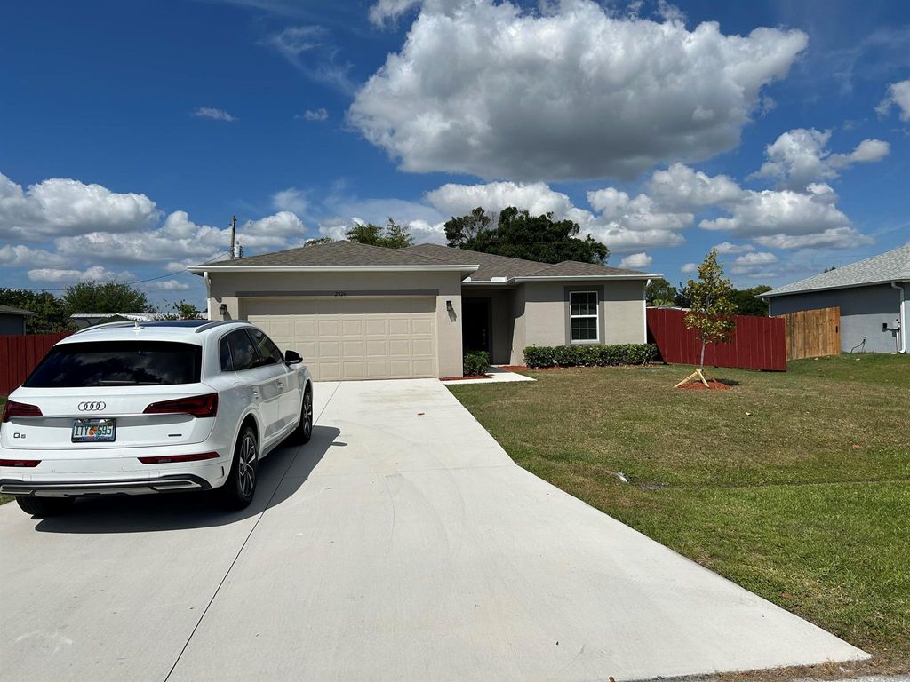 Photo of 2326 SE Patio Circle, Port Saint Lucie, FL 34952 (MLS # R10967382)