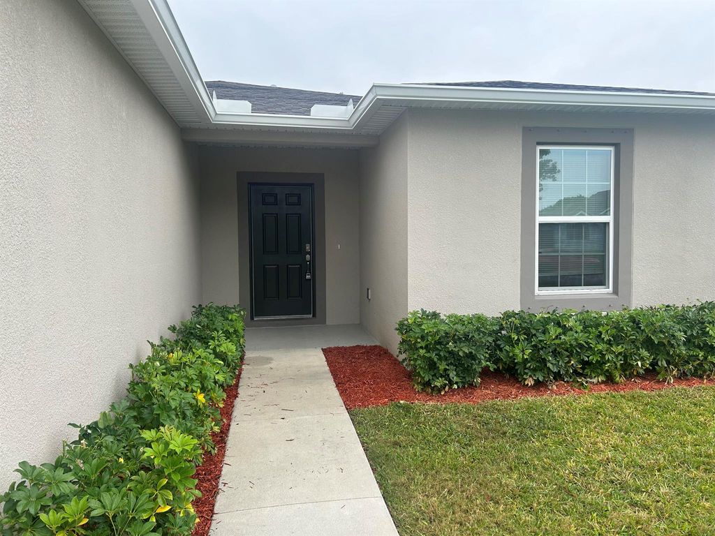 Photo of 2326 SE Patio Circle, Port Saint Lucie, FL 34952 (MLS # R10967382)