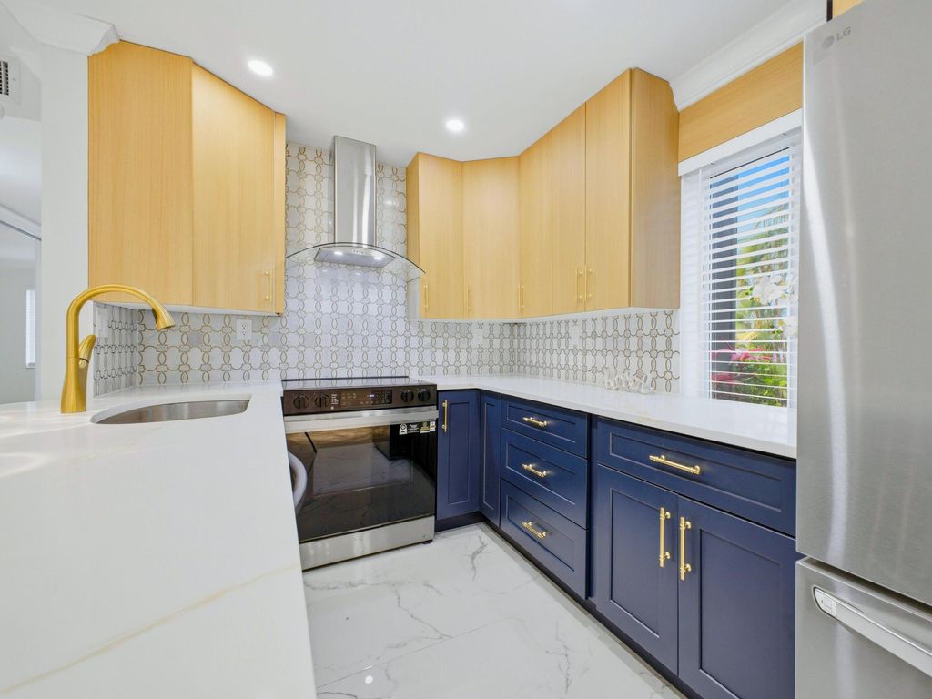 Photo of 6 Normandy A, Delray Beach, FL 33484 (MLS # B26016740)