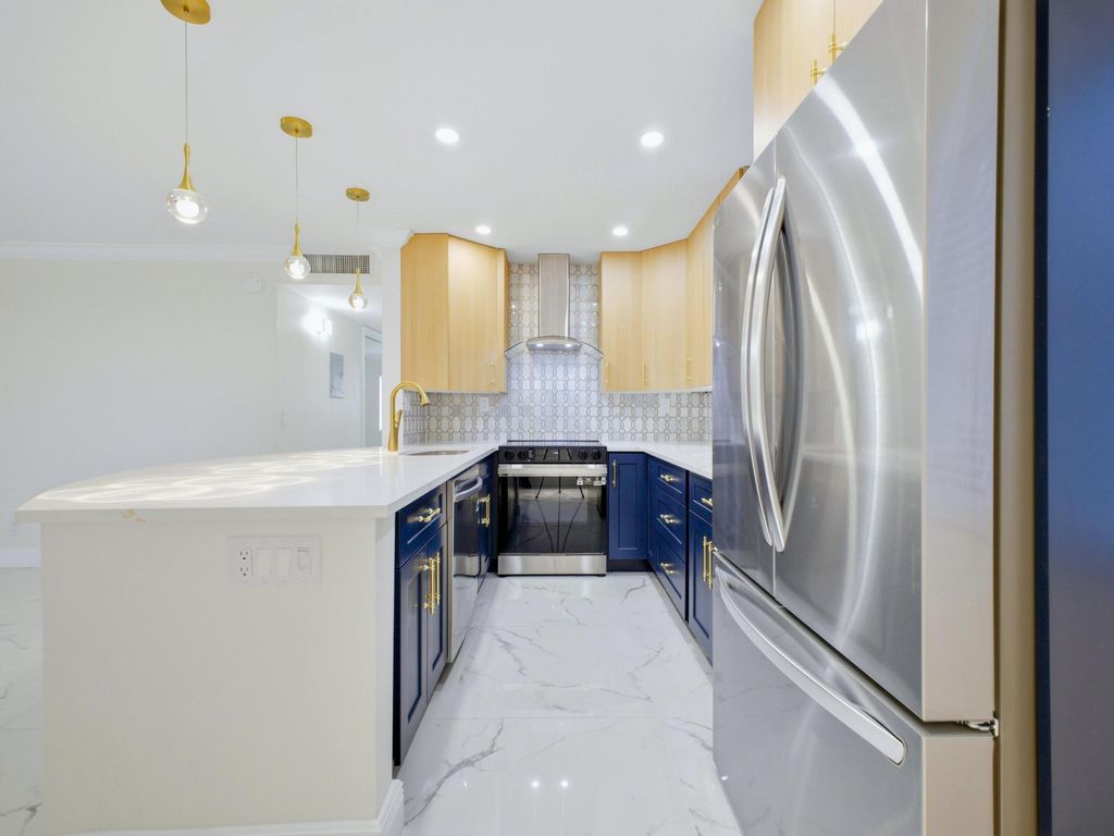 Photo of 6 Normandy A, Delray Beach, FL 33484 (MLS # B26016740)