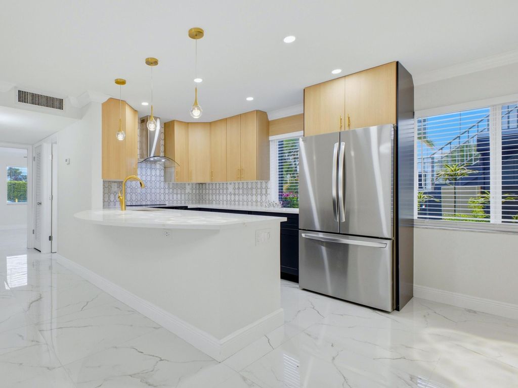 Photo of 6 Normandy A, Delray Beach, FL 33484 (MLS # B26016740)