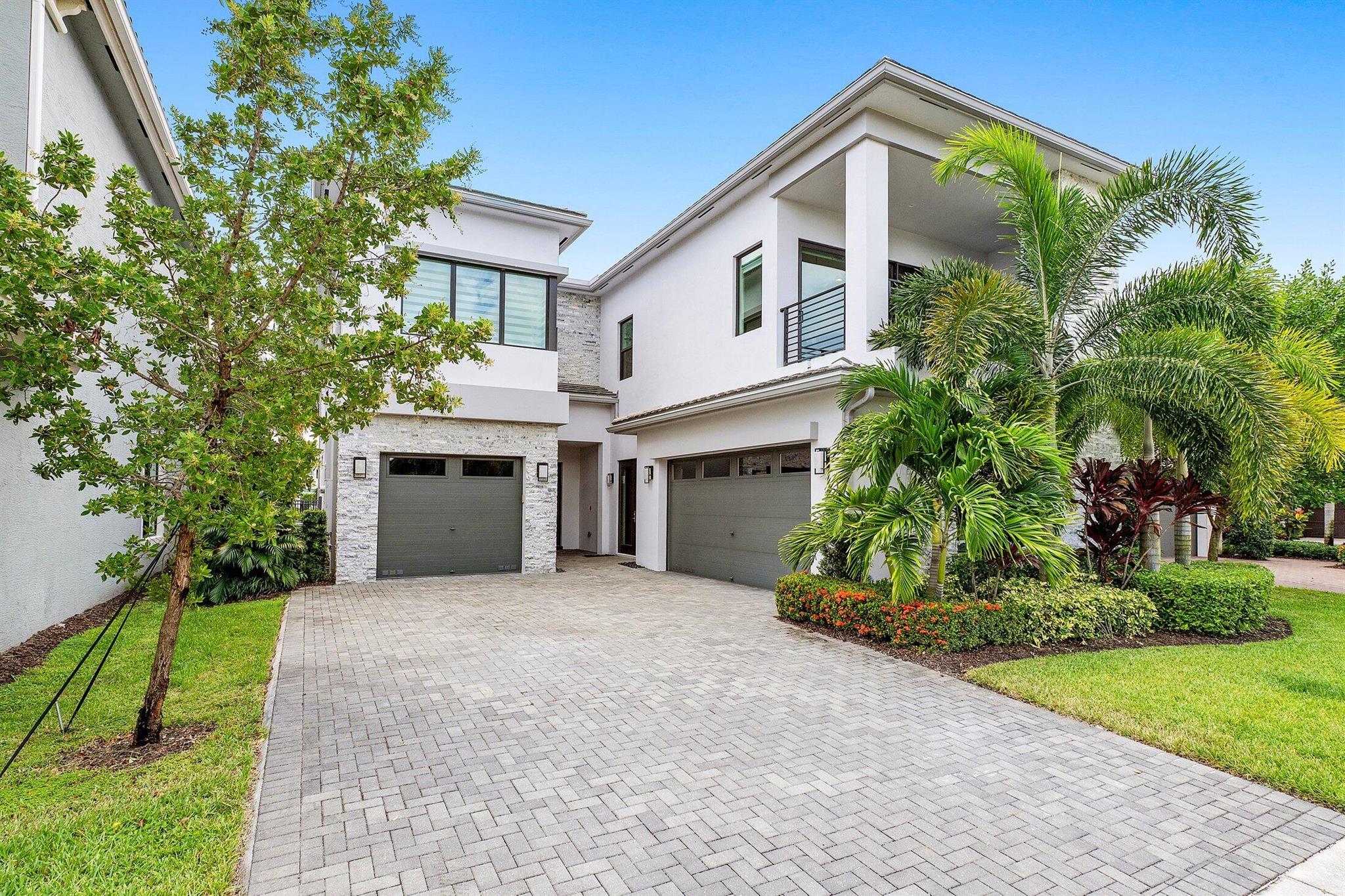 Experience refined living in this stunning 5-bedroom, 6-bathroom estate with a clubroom, offering an ideal floor plan for both everyday comfort and lavish entertaining. Step inside to discover a formal living and dining room, spacious family room, elegant club room, airy loft, and convenient cabana bath.The gourmet chef's island kitchen is a showstopper, featuring Quartz countertops, KitchenAid stainless steel appliances, a 5-burner gas cooktop, and a walk-in pantry. Upstairs, the master suite offers a sitting area, dual walk-in closets, and a spa-like en-suite. Three additional en-suite bedrooms and a loft complete the second level.This home is loaded with premium upgrades, including: custom blinds, built-ins for the bar and family