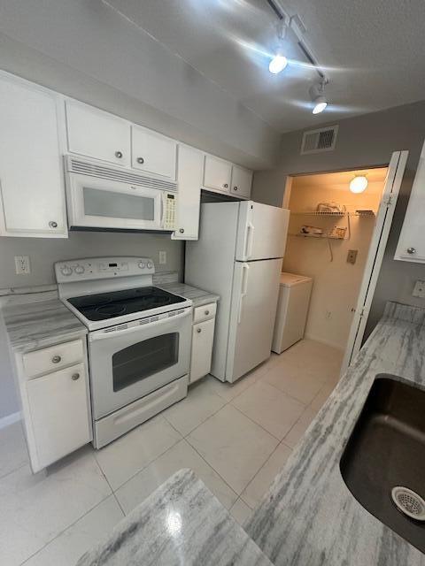Totally Updated, New Roof (May 2025) and New AC....2/2 condo in The Club, granite kitchen, tile floors, new paint. VACANT