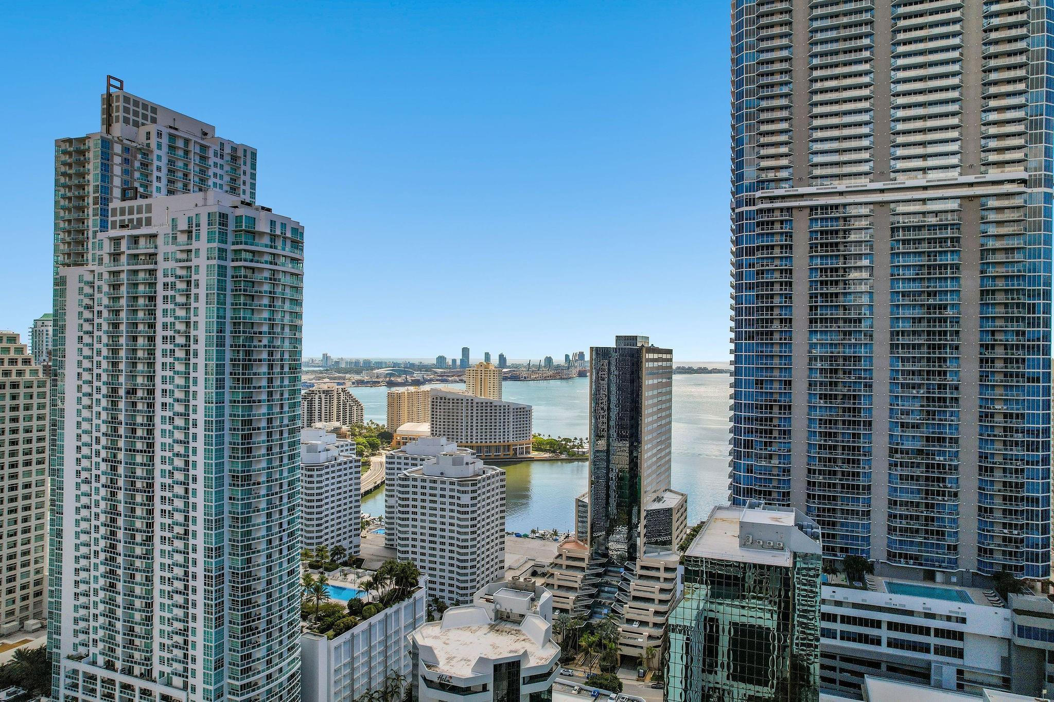 Enjoy the captivating bay views from this lovingly maintained 23rd-floor corner unit located in the heart of Brickell, Miami’s financial district, a vibrant area filled with dining, nightlife, shopping & entertainment! The thoughtfully designed layout features marble floors, floor-to-ceiling impact windows & an open living concept with a balcony offering unobstructed East exposure water/city views. The sleek kitchen features S-S appliances, granite counters, & W/D laundry closet. The amenities are top of line with lobby/valet attendance 24/7, pool/spa, fitness center, golf simulator & more! 1050 has fully funded reserves, is a pet & investor friendly building allowing rentals right away. With Mary Brickell Village, Brickell City Centre, & Metro all just steps away this unit is a must see!