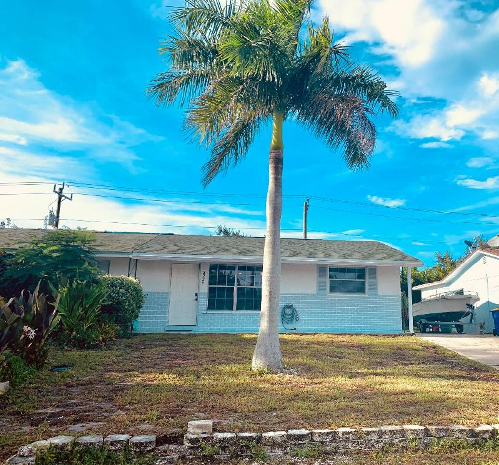 Photo of 2229 NE Rustic Way, Jensen Beach, FL 34957 (MLS # R10933609)