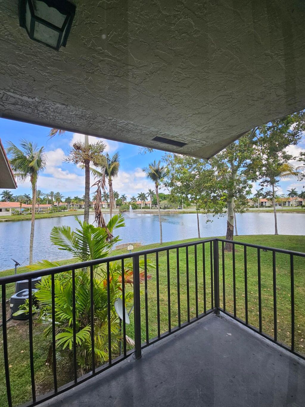 Photo of 1660 Windorah Way #H, West Palm Beach, FL 33411 (MLS # B26040633)