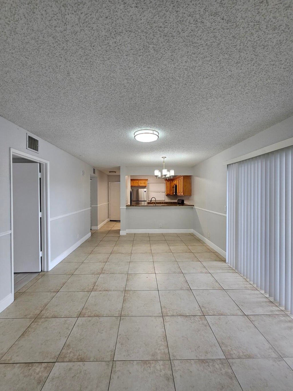 Photo of 1660 Windorah Way #H, West Palm Beach, FL 33411 (MLS # B26040633)