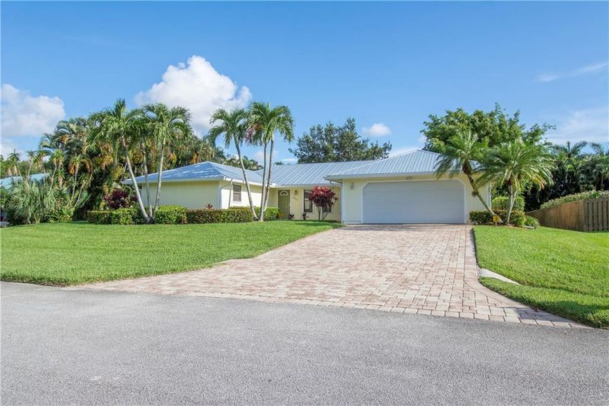 Quiet neighborhood. French doors. An 11 x 43 foot screened and covered patio. Large backyard enclosed by 25-foot areca palms and bamboo. New metal roof, secondary water barrier and whole house gutters installed in 2020! Remodeled kitchen. Ultra-black granite counters, wood cabinets, and pantry. The master bedroom has a walk-in closet. Large built-in lighted bookcases. New air conditioner installed in 2016 with 10-year parts and service warranty. Paver driveway. Sprinkler system, aluminum hurricane shutters and a hurricane rated garage door. All underground utilities. A hard-wired, monitored home security system. Motion sensor lighting around the entire house. The house is wired for a generator. A 1.2-mile bike ride to Bessey Creek Elementary.