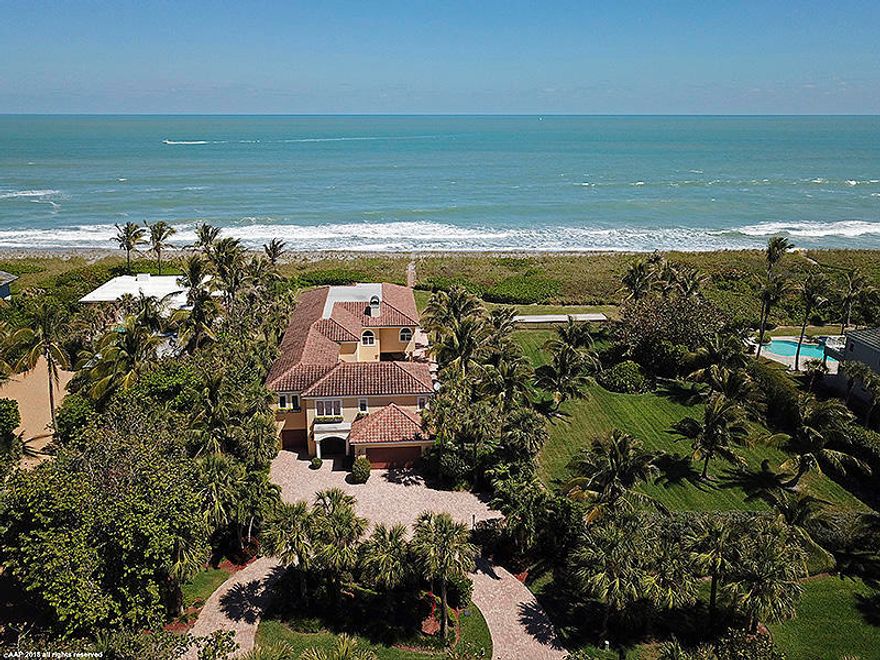 DIRECT OCEANFRONT, Custom 2-story! Enjoy the SAND & TURQUOISE SEAS right here ~~ This fine home features a spacious Master Suite & split-plan bedroom design, 4 Guest Bedrooms (2 Masters possible with a few changes). Chef's Kitchen opens to large Living Room with Marble Flooring, Built-Ins, and lovely Fireplace. The home is pre-designed to include an elevator. A 10-seat Home Theater is connected to a sizable Entertainment/Game Room with wet bar and beverage cooler. The ground level of the home opens to a Patio surrounding the Pool and Spa; plus a huge covered patio which functions perfectly for gatherings for family & friends. Full cabana bath, built-in BBQ, Wet Bar and a nearby Beach Dune Walkover. VACANT OCEANFRONT LOT ALSO AVAIL. SEE MLS#         ASKING $2.9MM