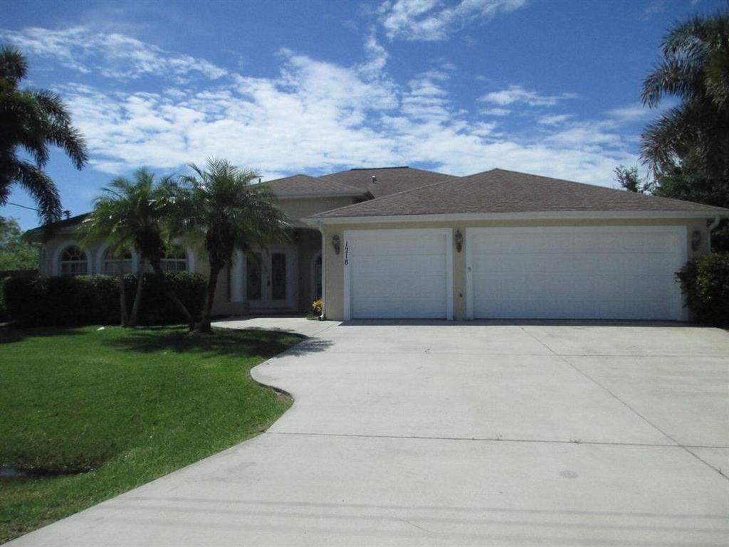 Photo of 1218 SW Santiago Avenue, Port Saint Lucie, FL 34953 (MLS # R10825231)
