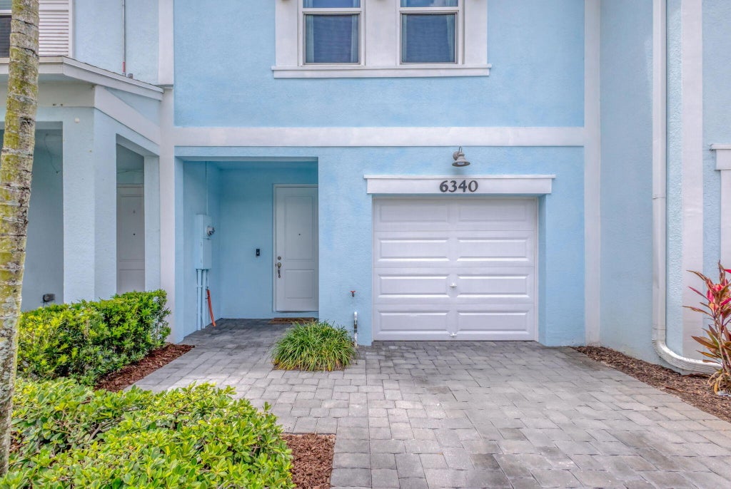 Photo of 6340 Sailpointe Lane, West Palm Beach, FL 33413 (MLS # R11093337)