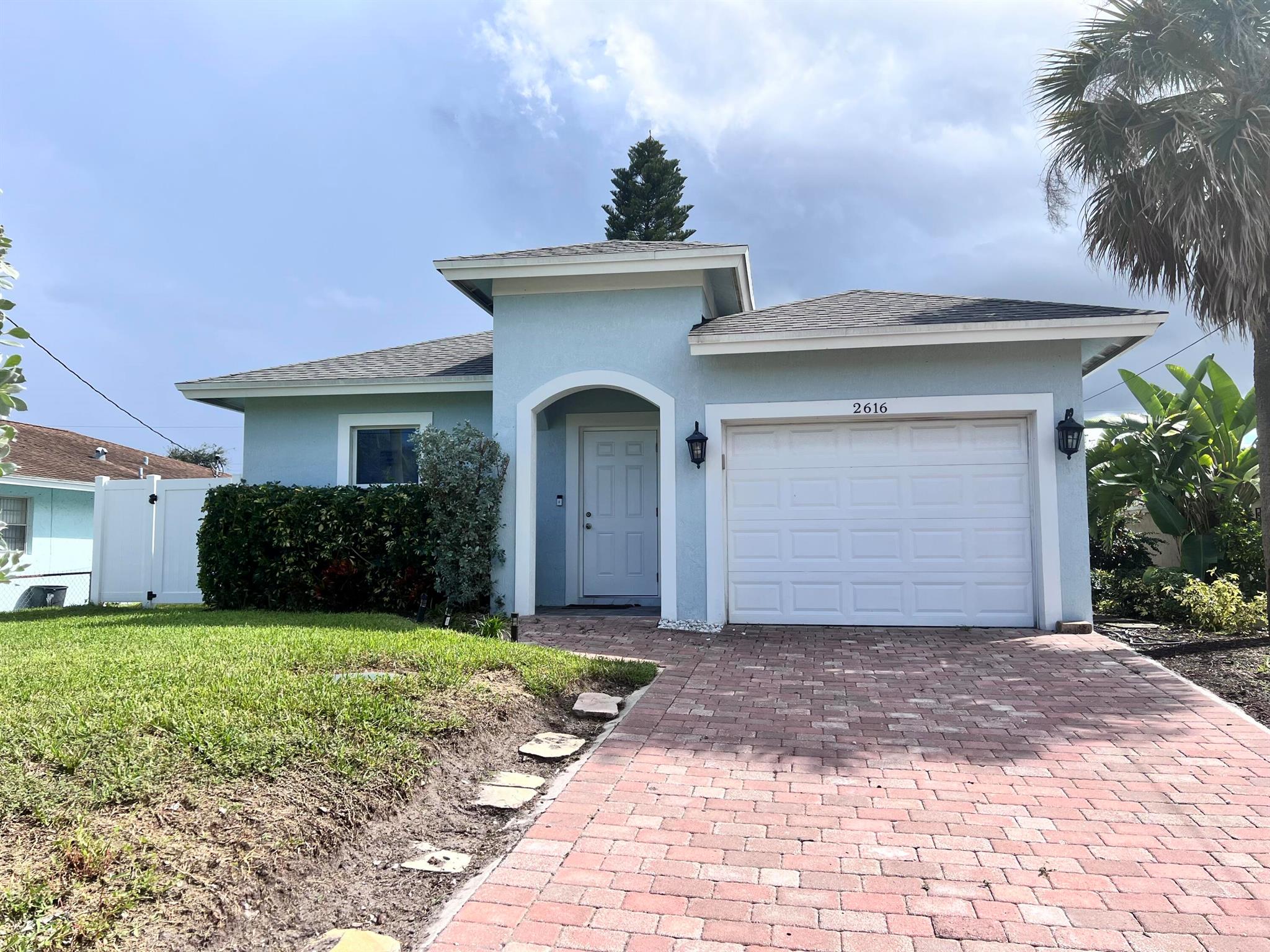 Beautiful single family home, built in 2021 with newer construction codes, 3beds/2baths, 1 car garage, with no HOA, built in a 4,972 sq ft lot, excellent location, good neighborhood, feel in love when you enter to this gem! 9+ foot high ceilings, complete impact windows, ceramic and porcelain tile flooring, granite counter tops, wood cabinets, wood floor in all bedrooms, living room/dining area, modern LED hi-hats, Master bedroom with walking closet, master bedroom with porcelain mosaic floor, stainless steel appliances, garage floor just been done as well with epoxy shiny finish, driveway with pavers, automatic irrigation system, city water, close to I-95, restaurants, do not wait to meet this beauty in person!
