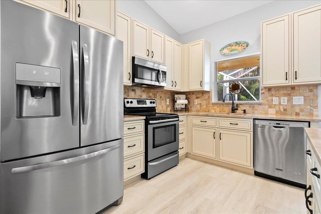 Photo of 10174 Plum Street, Palm Beach Gardens, FL 33410 (MLS # R10941716)