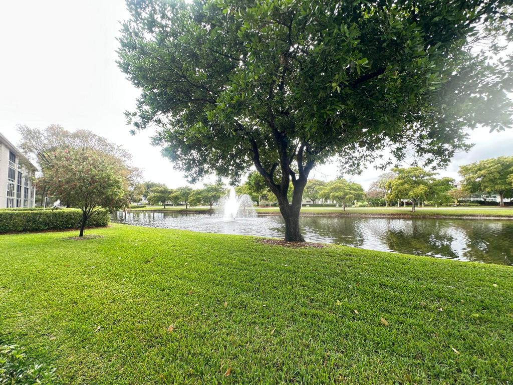 Photo of 2005 Granada Dr #K1, Coconut Creek, FL 33066 (MLS # B26018507)