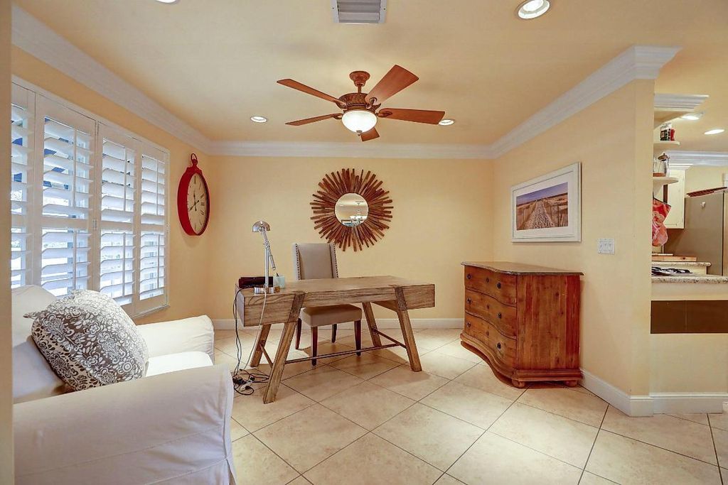 Photo of 12046 Prosperity Farms Road, Palm Beach Gardens, FL 33410 (MLS # R10982090)