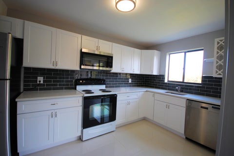 Photo of 5917 Via Vermilya #308, Lake Worth, FL 33462 (MLS # B26051939)