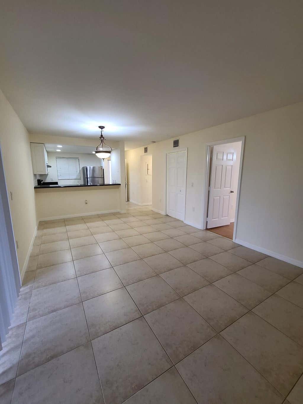 Photo of 1547 LAKE CRYSTAL Drive #A, West Palm Beach, FL 33411 (MLS # B26063302)