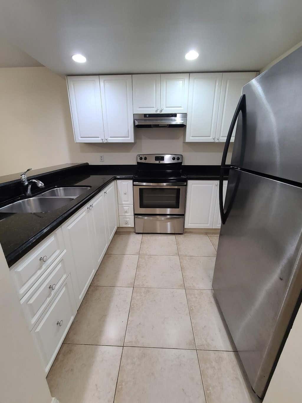 Photo of 1547 LAKE CRYSTAL Drive #A, West Palm Beach, FL 33411 (MLS # B26063302)