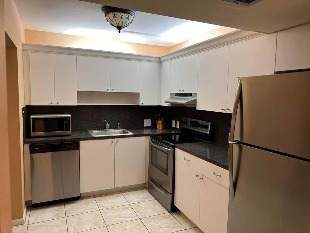 Photo of 203 Suffolk #E, Boca Raton, FL 33434 (MLS # B26047736)