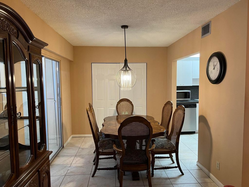 Photo of 203 Suffolk #E, Boca Raton, FL 33434 (MLS # B26047736)