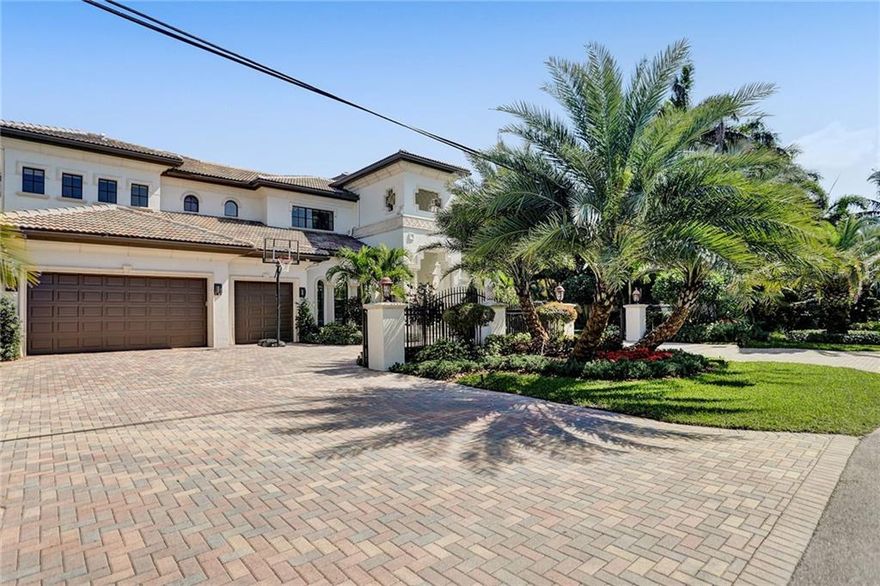 Live your luxury lifestyle in this Contemporary and Elegant Gated Lighthouse Point home. Enjoy amazing views of the Intracoastal Waterway and iconic Hillsboro Lighthouse from almost every room. The gated residence was custom built in 2001 and features 4 bedrooms, 6 bathrooms, office, loft, elevator, wet bar, New custom Kitchen cabinetry and closet systems, New whole-house generator and so much more. New Roof, Kitchen, Appliances, Impact windows and doors, Infinity-edge pool and spa, 100’ of water frontage and a T dock with 2  boat lifts, water and electricity that can accommodate multiple vessels including your Yacht in NO WAKE ZONE! .