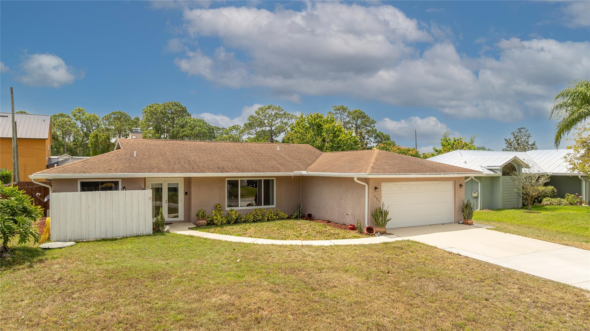 Welcome home to this charming 3 bedroom, 2 bath residence in a sought-after family neighborhood! Boasting 1900 sq ft of living space on a sprawling 10,000 sq ft lot, this property offers everything you need. Enjoy a refreshing dip in the sparkling pool, cozy evenings by the fireplace, and outdoor entertaining on the spacious 336 sq ft patio. A 2-car garage (400 sq ft), A Full Size laundry room, and fully fenced backyard complete this perfect family haven.