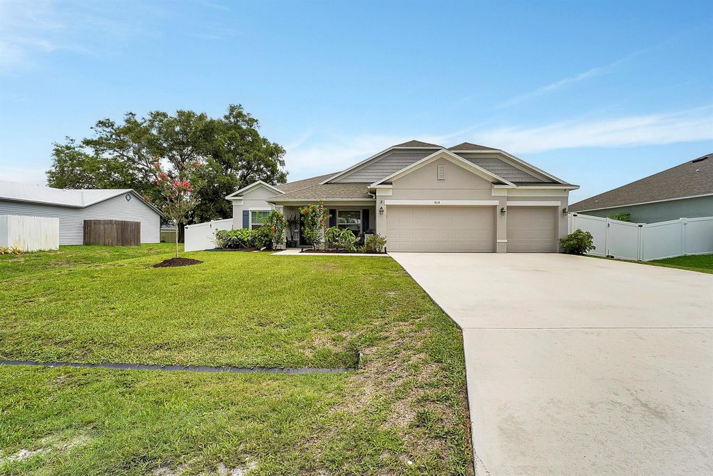 Photo of 868 SW Haas Avenue, Port Saint Lucie, FL 34953 (MLS # R10997455)