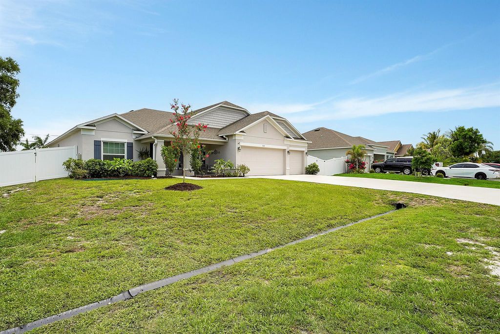 Photo of 868 SW Haas Avenue, Port Saint Lucie, FL 34953 (MLS # R10997455)