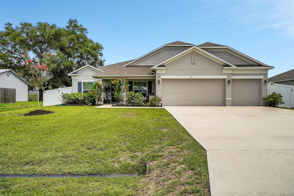 Photo of 868 SW Haas Avenue, Port Saint Lucie, FL 34953 (MLS # R10997455)